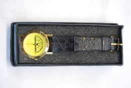 A cased Sun Records 18K gold plate wrist watch with Sun logo face.