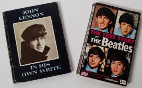 A John Lennon 'In his Own Write' Hardback 1st edition book. Torn centre page but present, along with