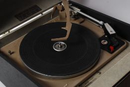 A 1960's Hacker Gondolier portable record player with Garrard deck, in working order having had a