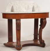 A Victorian mahogany and marble top washstand / side table. Raised on turned legs with white