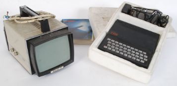 An original ZX81 Spectrum home computer together with a 1970's Russian Rigonda portable television