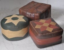 A good collection of 3 vintage mid 20th century leather pouffes. To include one green with cream