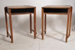 A pair of 19th century oak school desks / Industrial bedside tables. Raised on shaped supports