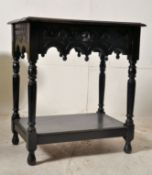 A 19th century Jacobean revival oak side / hall / lamp table. Raised on turned legs with lower