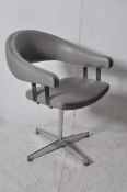 A retro 1970's chrome and vinyl work office swivel desk chair. Chrome base having original vinyl