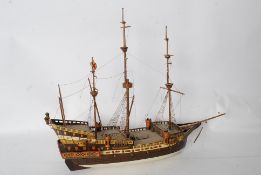 A mid 20th century decorative wooden model galleon boat complete with rigging and sales