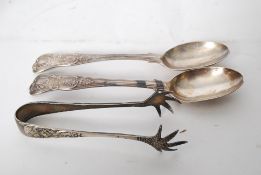 Two silver hallmarked tea spoons dated to 1873 along with a pair of silver plate sugar tongs