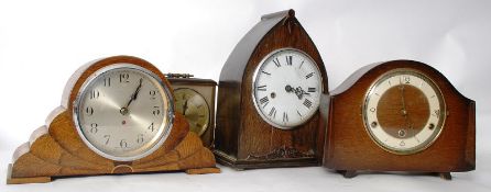 A collection of four vintage mantel clocks to include an Art Deco fan style, one with marble /