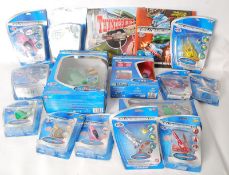 A collection of Thunderbirds toys to include radio controlled, figures etc. Most sealed in