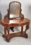 A Victorian mahogany duchess dressing table. Raised on carved embellished supports having lower