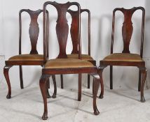 A set of 4 Edwardian mahogany Queen Anne dining chairs. Cabriole legs with pad feet supporting