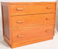 A good 1940's Air Ministry oak chest of drawers. Inset plinth base having a straight set of 3