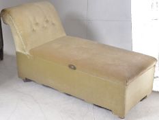 A 1930's Art Deco chaise longue ottoman / day bed. Angular velour upholstered frame having reclining