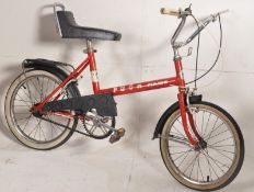 An original 1970's Puch Pirate bicycle. Similar to the Raleigh Chopper, the bike having cow horn