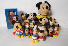 A collection of vintage Mickey Mouse Disney Tours to include bendy figures soft toys and other