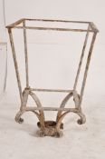 A large late Victorian wrought iron tavern / street lamp frame of square tapering form.