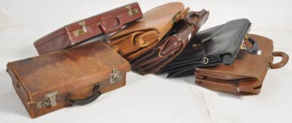 A collection of 20th century and vintage leather briefcase / attache cases