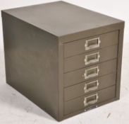 A set of vintage military army green filing cabinet drawers