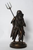 An unusual 20th century cast iron fire compendium in the form of Fagin from Oliver Twist and