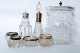 A collection of cut glass silver / silver plate topped items to include a sifter and others. 7