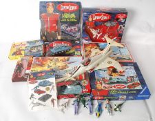 A box of Captain Scarlet memorabilia to include vintage jigsaw puzzles, figures, soaps etc.