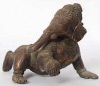 A small bronze Indian figure of Visnu.