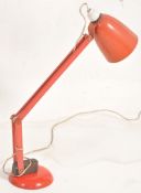 A retro 1960's / 1970's wall mounted red anglepoise lamp complete with shade.