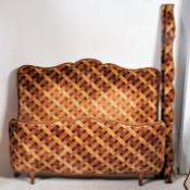 A 1930's Art Deco French walnut upholstered Corbeille double bed. Upholstered in the original fabric