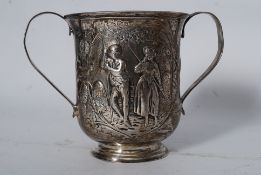 A Georgian twin handled silver pot with interesting shieild decorated with the lion rampant tied