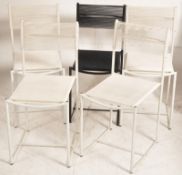 A set of 5 Spaghetti chairs by Giandomenico Belotti from Alias Chairs of Italy. 4 white chairs and 1