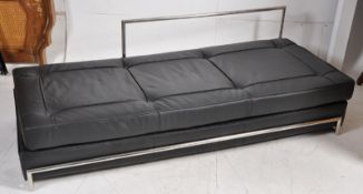 A good chrome and black leather sofa / day bed of Italian design. The low frame having raised chrome