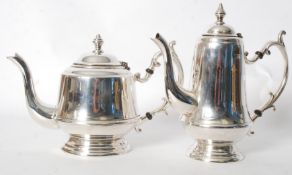 A silver plate coffee pot and a silver plate teapot, with makers marks to base.