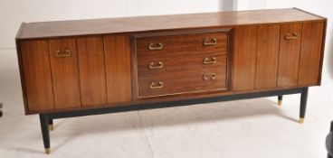 A 1960's G-Plan retro original tola wood large sidboard. Raised on ebonised legs the wide body