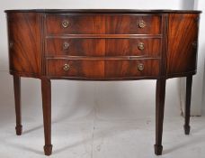 A Georgian / Regency style mahogany inlaid bow front sideboard dresser. Raised on square legs with