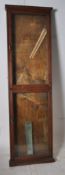 A 20th century large pine shop / haberdashery display cabinet of tall proportions. The tall