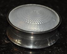 A hallmarked silver snuff box having enamel set top by Henry Matthews 1912.