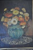 A good early 20th century oil on board still life painting of chrysanthemum's in a basket. Unsigned,