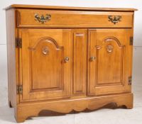 A French Louis Cannes style walnut sideboard cabinet. Raised on bracket plinth base with cupboard