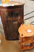 A mahogany glazed wall hanging display cabinet / corner unit along with a retro patterned 3 tier