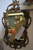 A vintage gilt framed mirror