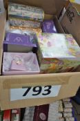 A quantity of boxed collectable items to include Fairy collection, Leonardo and other items