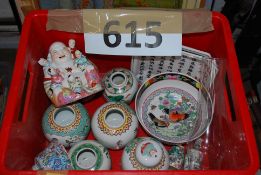 A collection of oriental ceramics to include figure, plate, vase and other items.