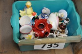 A mixed lot to include china, vases, ruby red glass bottle, flower pots and other items.
