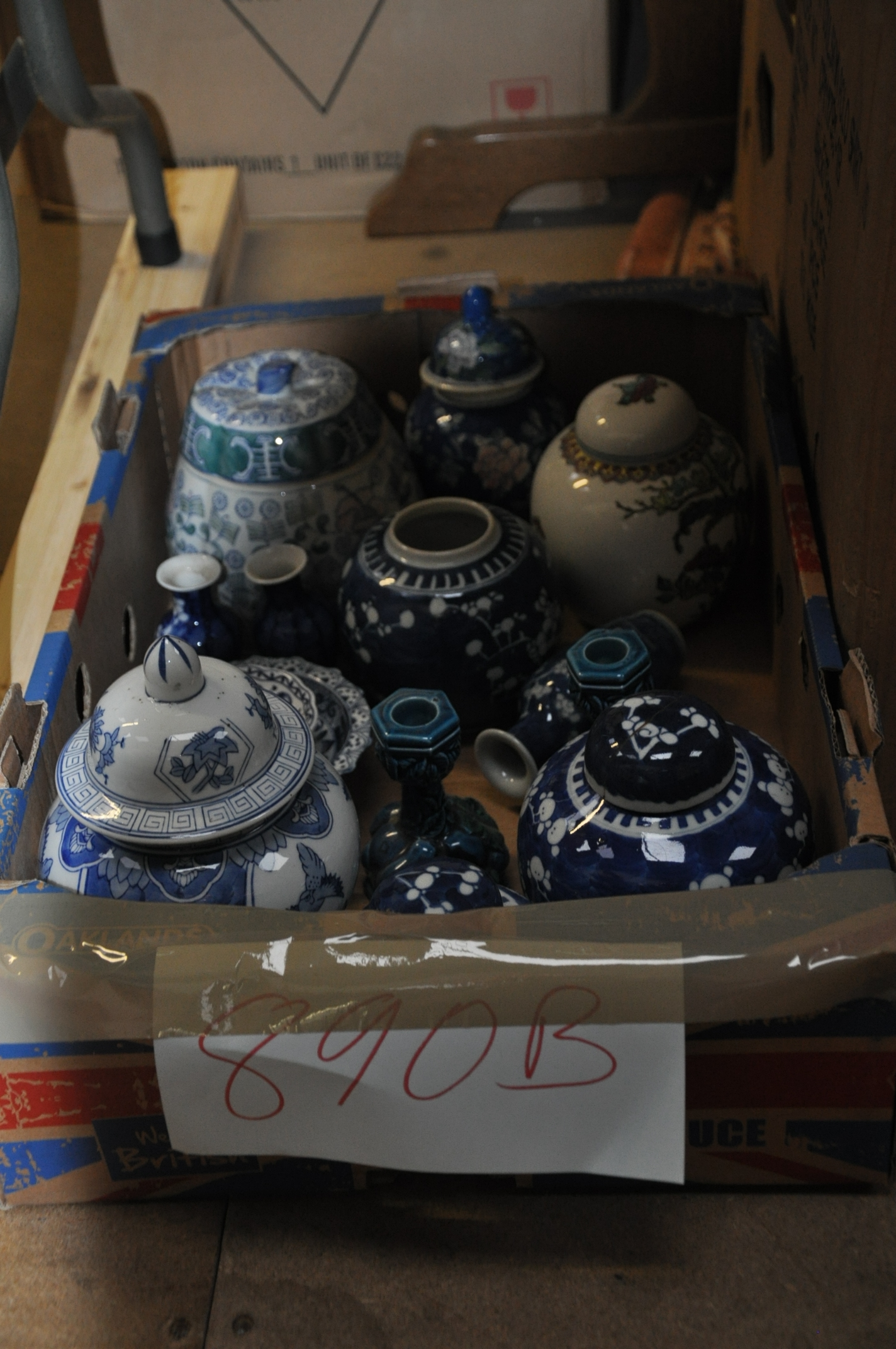 A box of china to include oriental ginger jars, pair of Japanese candlesticks etc.