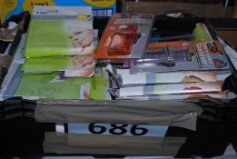 A selection of boxed towel Turbie wraps and waterproof containers etc.