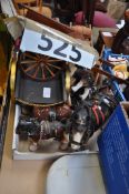 A collection of china Shire Horses and wooden carts, of varying size.