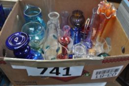 A mixed lot of glassware, orange vases, water jug and other items.