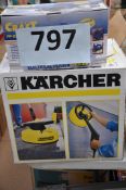 TOOLS: A Karcher pressure washer scrub attachment along with a boxed Powercraft electrical planing