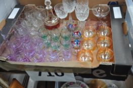 A mixed box to include glassware, wine glasses, orange coloured wine glasses and others.