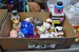 A selection  novelty items to include a Bertie Basset advertising money box, Dusty Bin, Donald